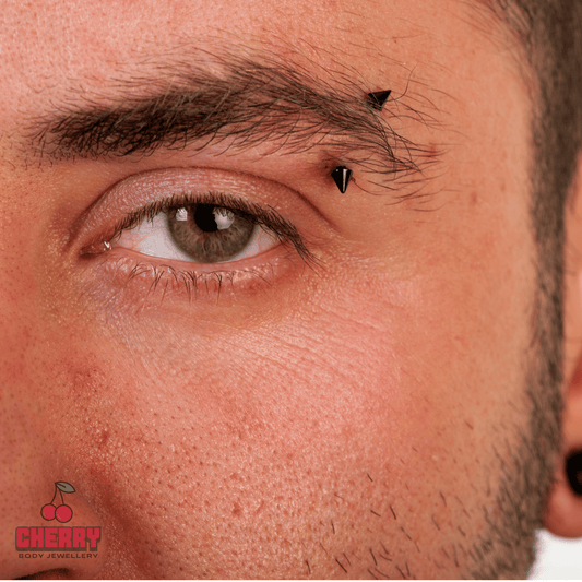 Black Steel Curved Barbell with Spike 14g