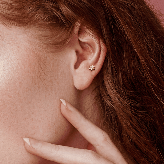 Flower Solitaire Gem Tragus Cartilage Bar worn