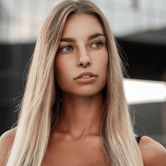 Hinged clicker ring with 5 flush gems worn