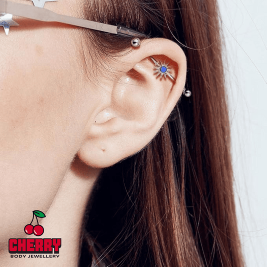 Opal Center Sunburst industrial Barbell worn