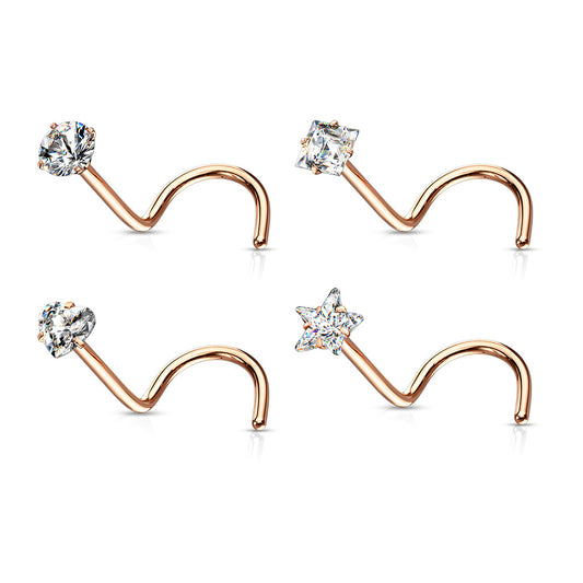 Set of rose gold nose rings with clear gemstones on a white background