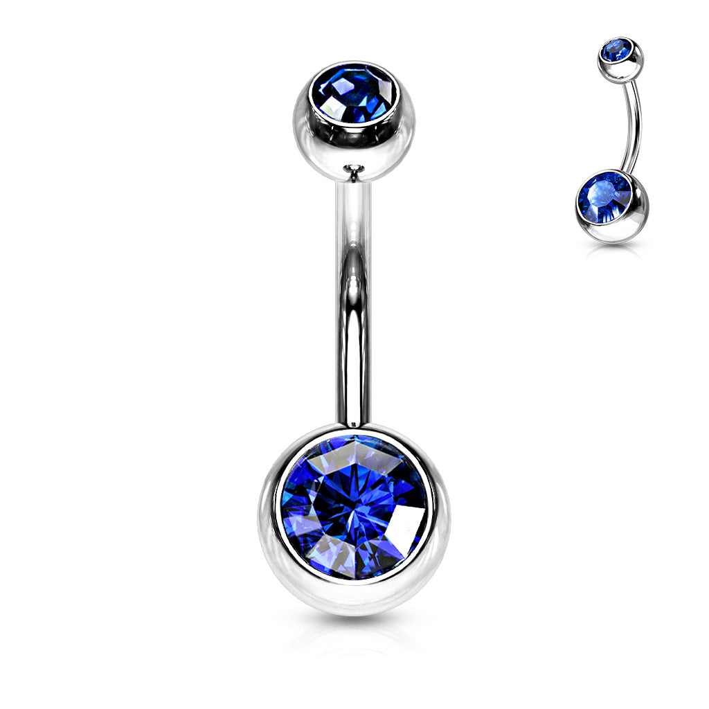Silver belly button ring with blue gemstones on a white background