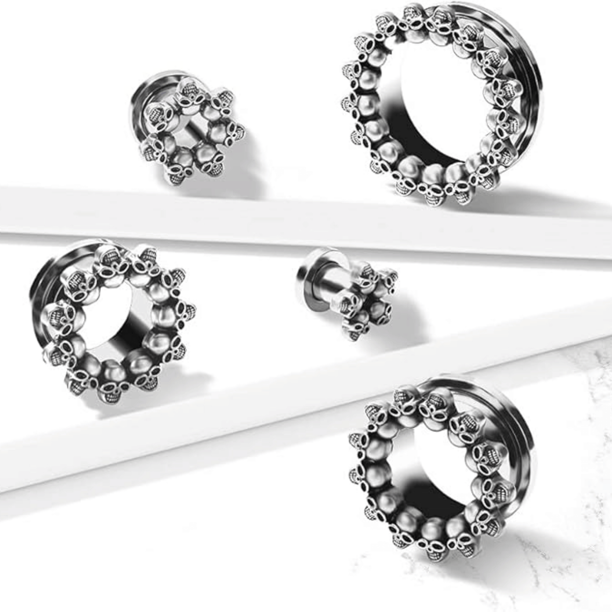 Circle of skulls ear lobe tunnel