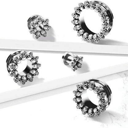 Circle of skulls ear lobe tunnel