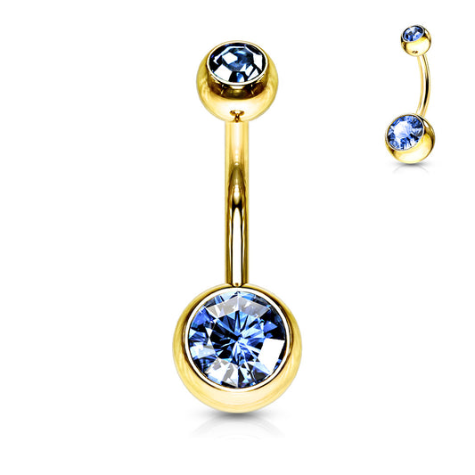 Gold belly button ring with blue gemstones on a white background
