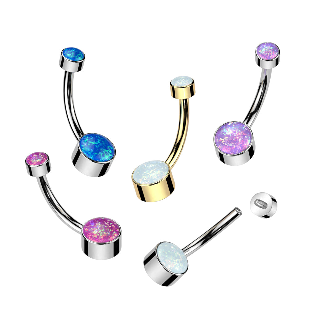 Five curved barbell belly button piercings with round bezel-set opal-like stones in blue, purple, pink, white, and iridescent finishes, shown on a plain white background with one earring separated to display the back post.