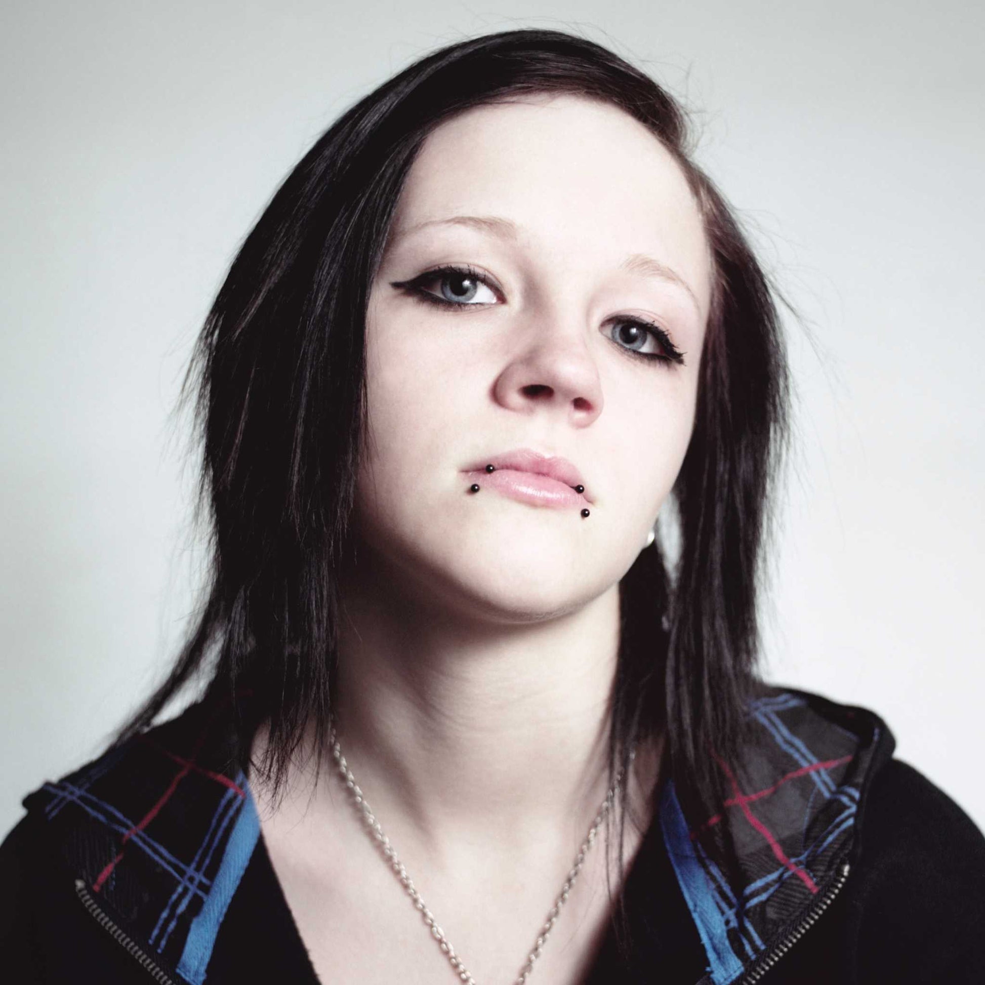 black circular lip ring